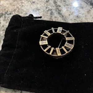 Gold and Black Roman Numeral Brooch